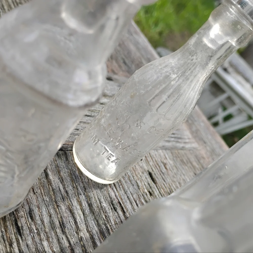 Collection of 8 vintage antique bottles